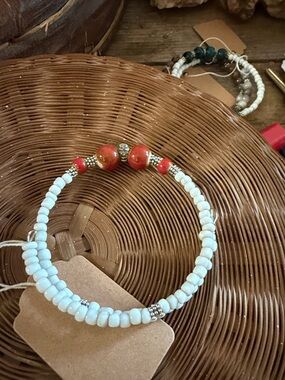 White Beaded Memory Wire Bracelet with Red Accent Beads